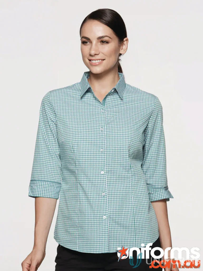 Woman wearing Epsom Lady Shirt 3/4 Sleeve with green and white checkered tonal pattern for workwear or uniforms