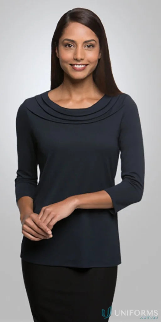 Woman in navy Eva Knit 3Q Top showing off stylish knit style and Eva Knit fashion