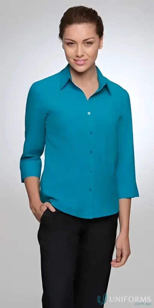 Woman in Ezylin Ladies 3Qtr Shirt with shaped hem and open neckline, perfect for work uniforms