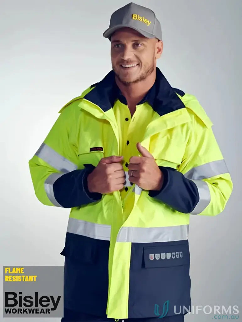 High-visibility flame resistant work jacket with reflective stripes and touch tape closure for hazardous environments