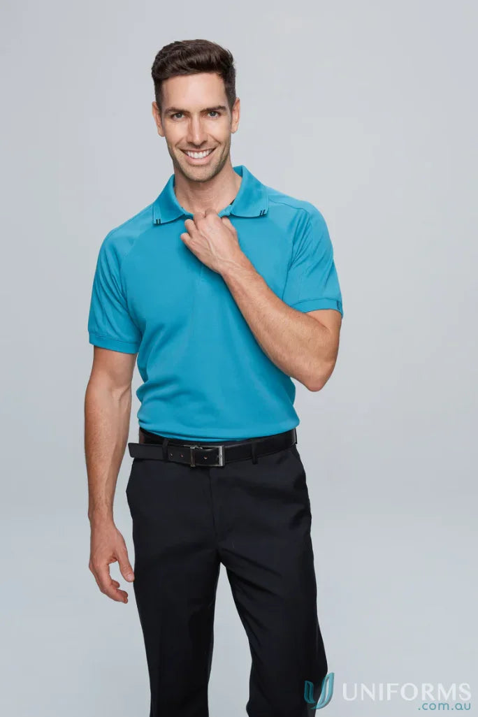 Man in turquoise workwear Flinders Polo shirt and black pants for uniforms