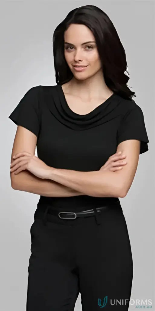 Woman in black eva knit short-sleeve cowl neck top with belt, stylish knit style look