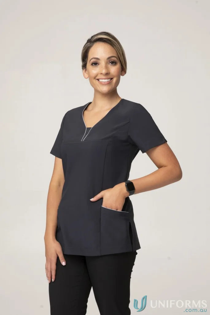 Woman in dark gray medical scrubs from the fabulous city collection