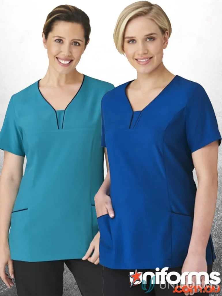 Two women in medical scrubs from the fabulous city collection, showcasing style and comfort