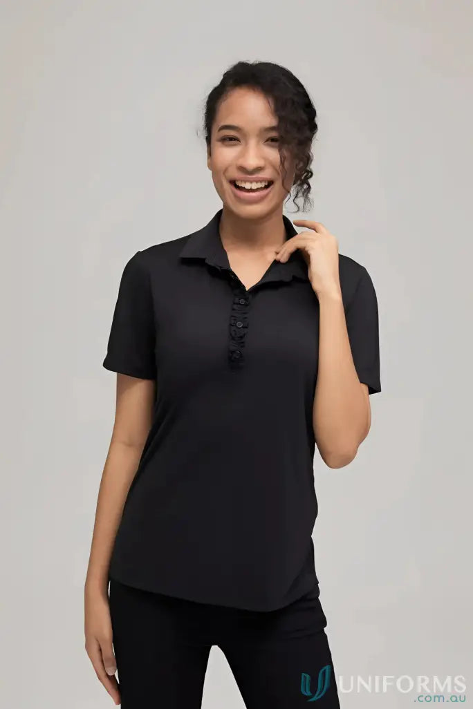 Bella short sleeve black polo shirt with ruffled placket made of polyester matte jersey for all-day comfort