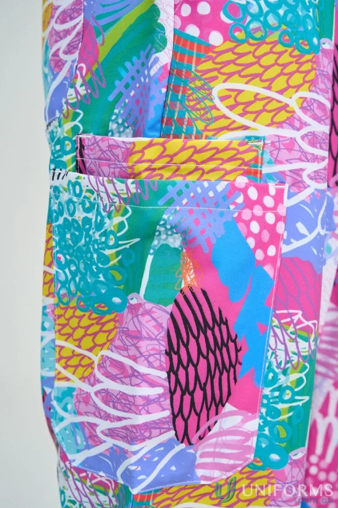 Colorful patterned pocket on Gliding Bunjil Pant from the Collection Gliding Bunjil for healthcare pros