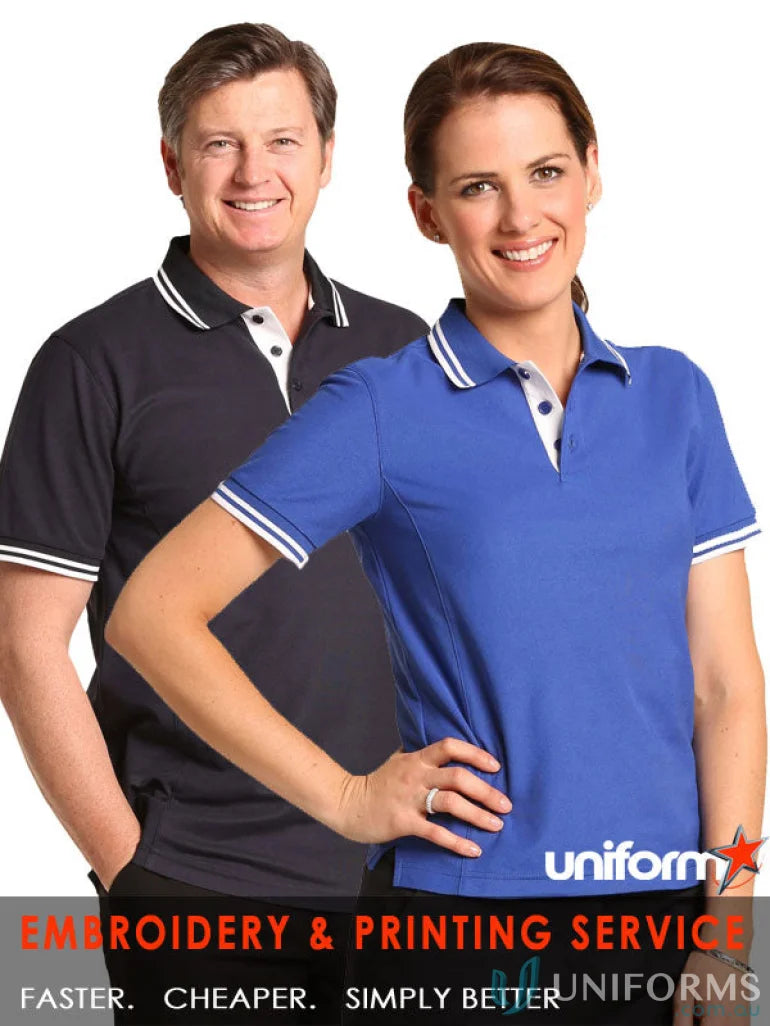 Two people in Grace Polo shirts featuring truedry pique short sleeve polo ps65 style