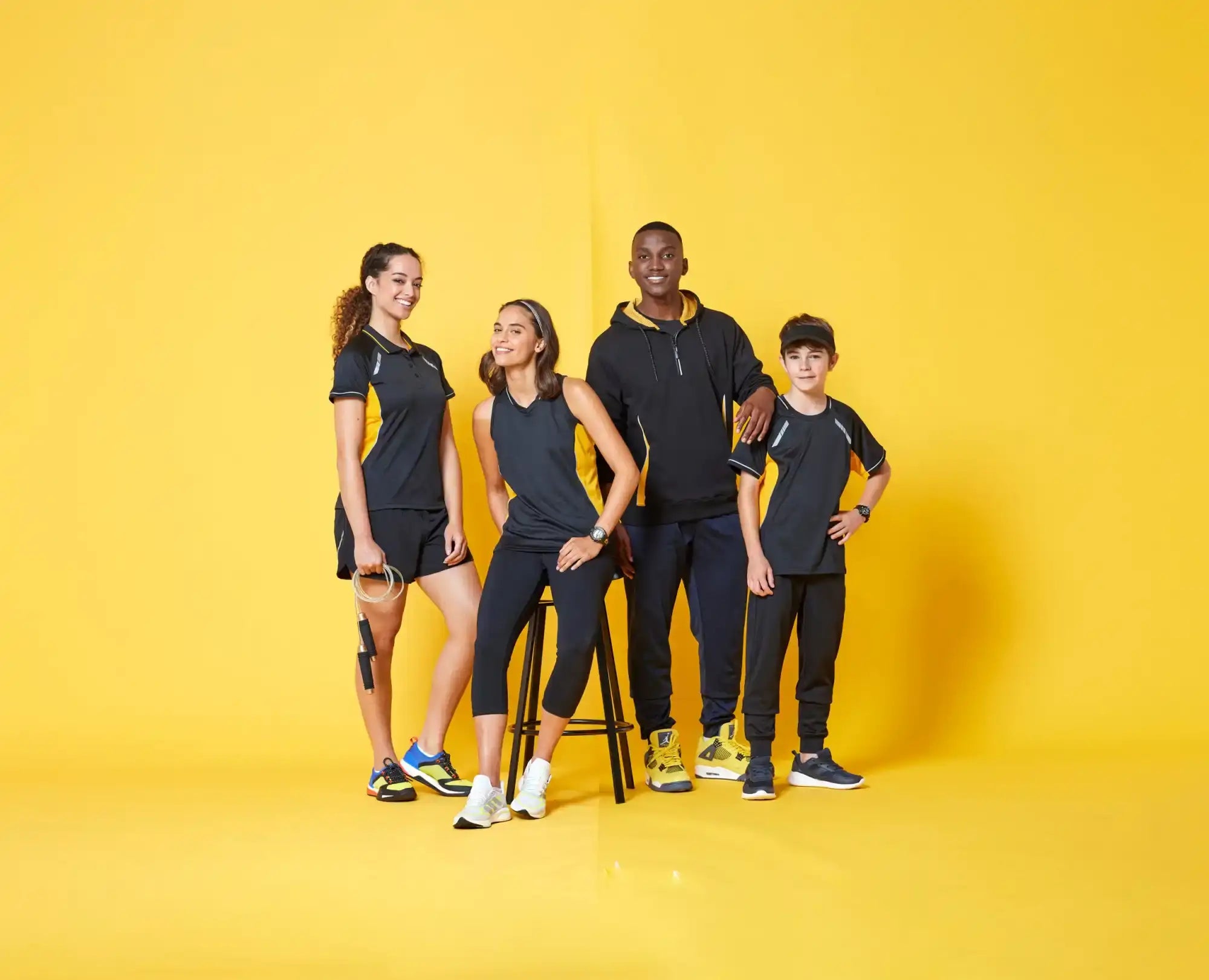 Group of people wearing athletic clothing.