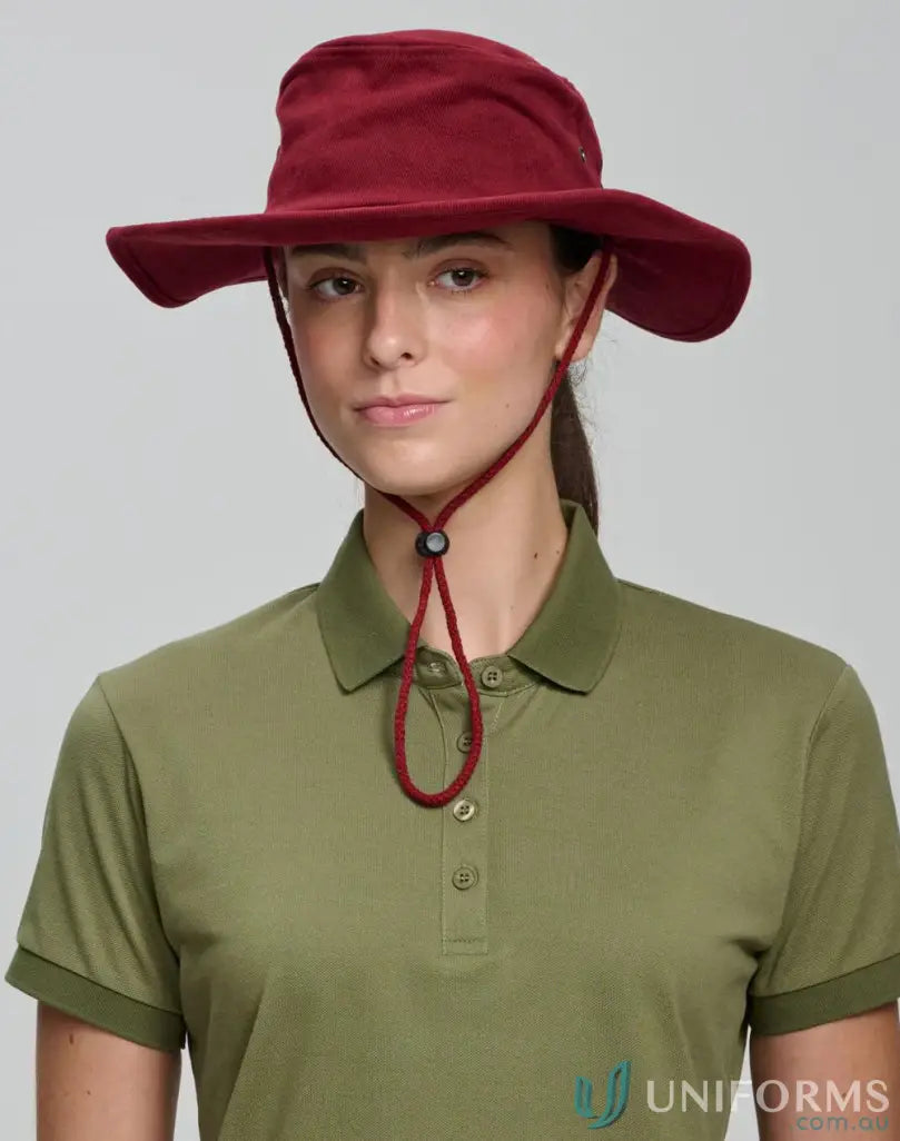 Woman in winning spirit heavy brushed cotton hat with sun protection and chin strap