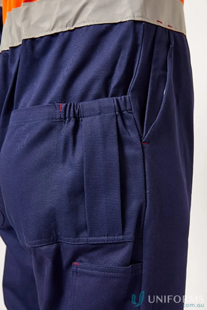 Blue work pants with pockets from HI VIS Coverall Ind Tape featuring press studs and durable fabric