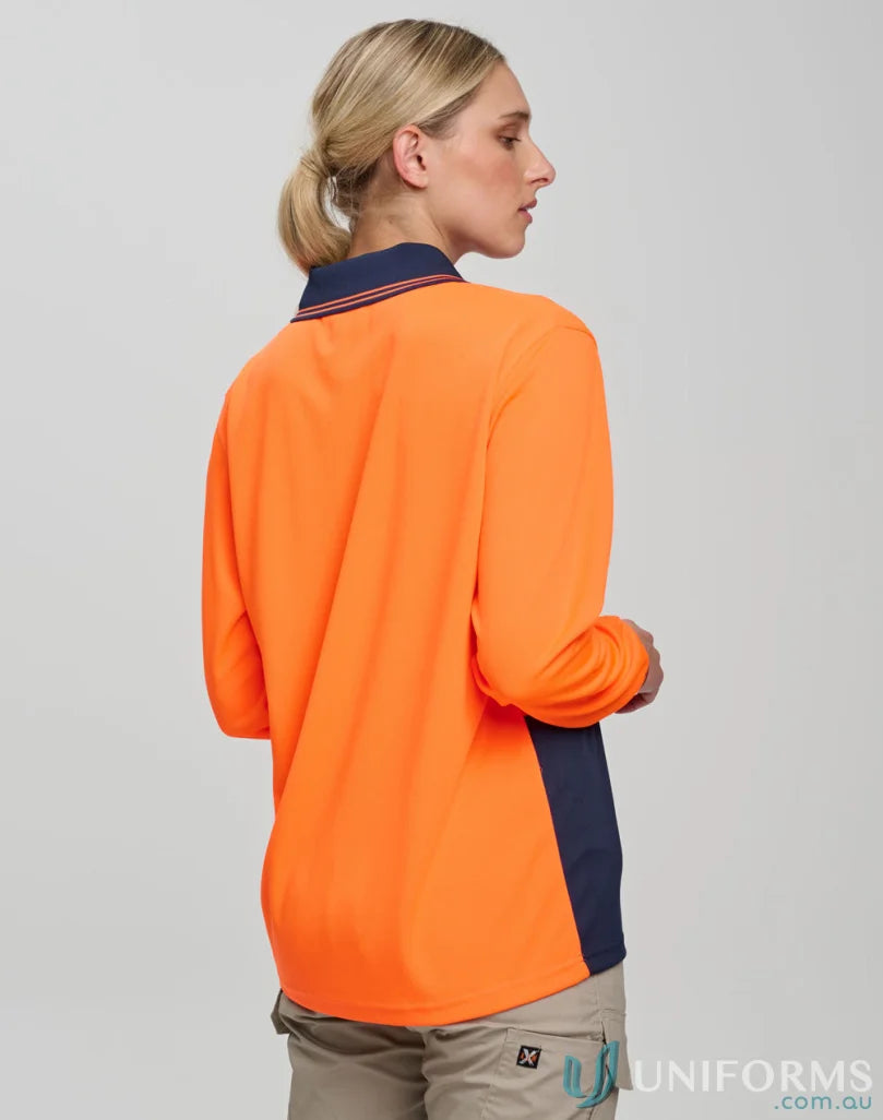 Woman wearing HiVis CoolDry Safety L/S Polo in orange and navy for high visibility