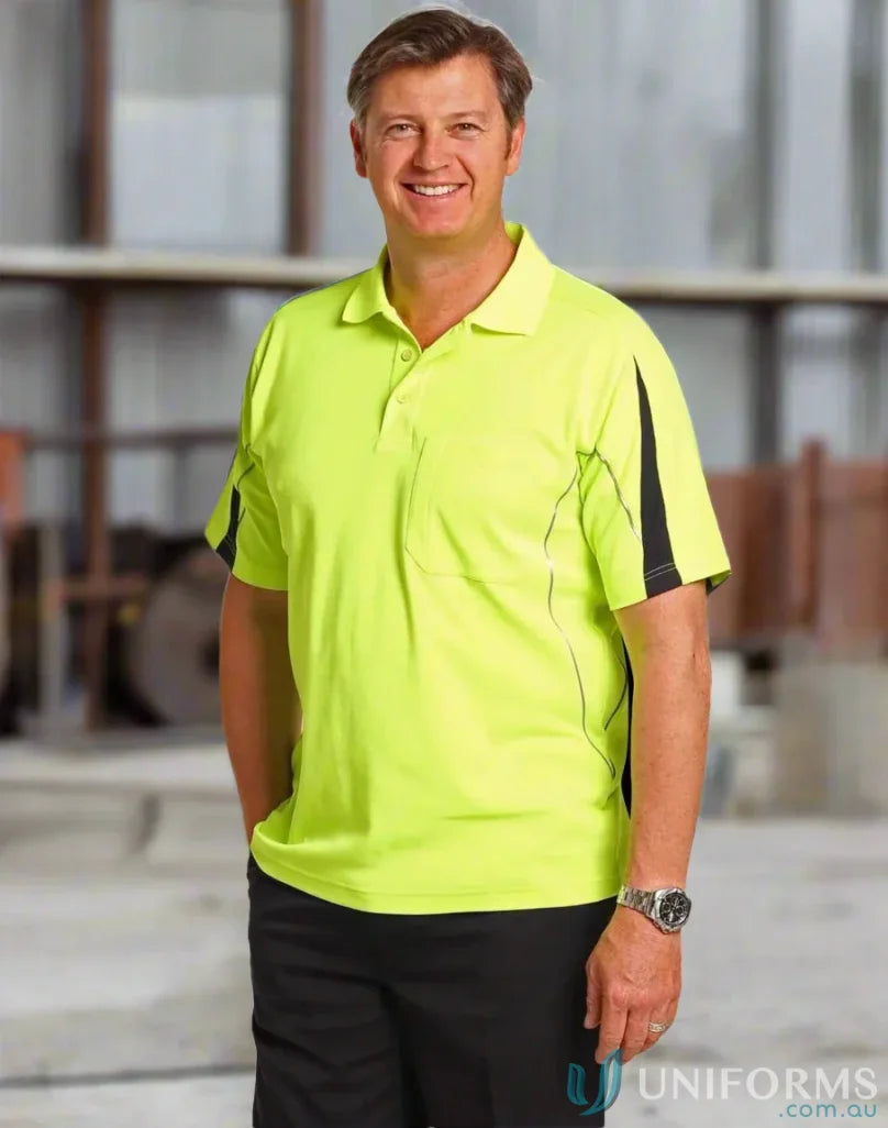 Man in sw25a Hi-Vis Legend SS Polo with contrast color sleeves and black pants