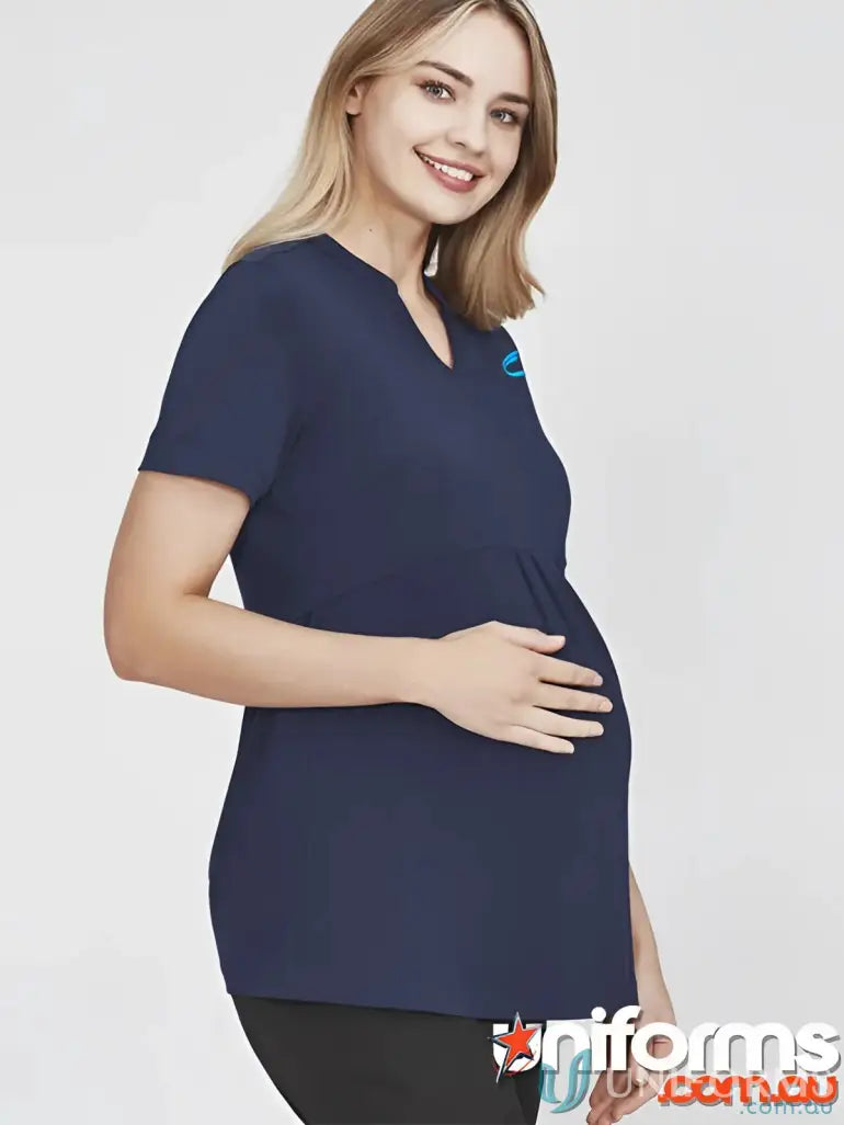 Pregnant woman in navy blue IOP Ladies Easy Fit Top rt262ls workwear uniform