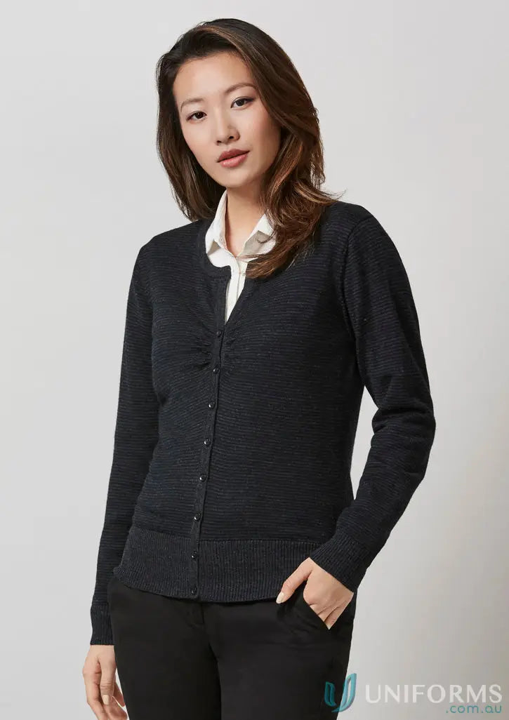 Black ladies merino cardigan layered over white collared shirt from IOP EMB Ladies collection