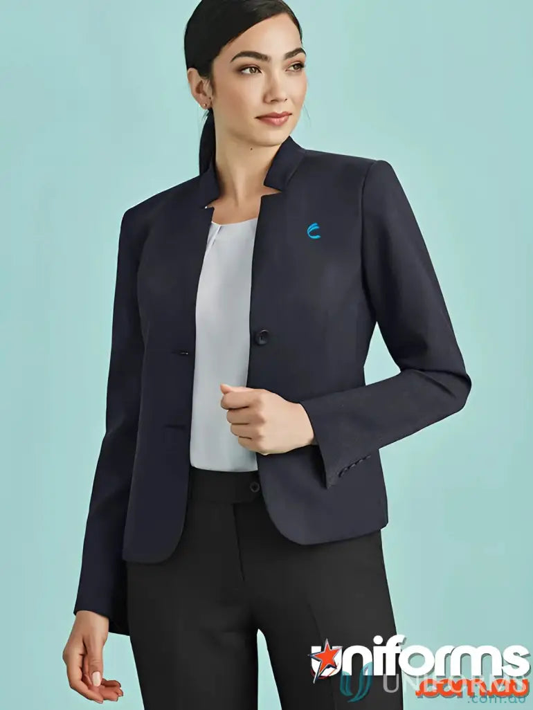 Woman wearing IOP Ladies Reverse Lapel Jacket navy blazer and black workwear pants