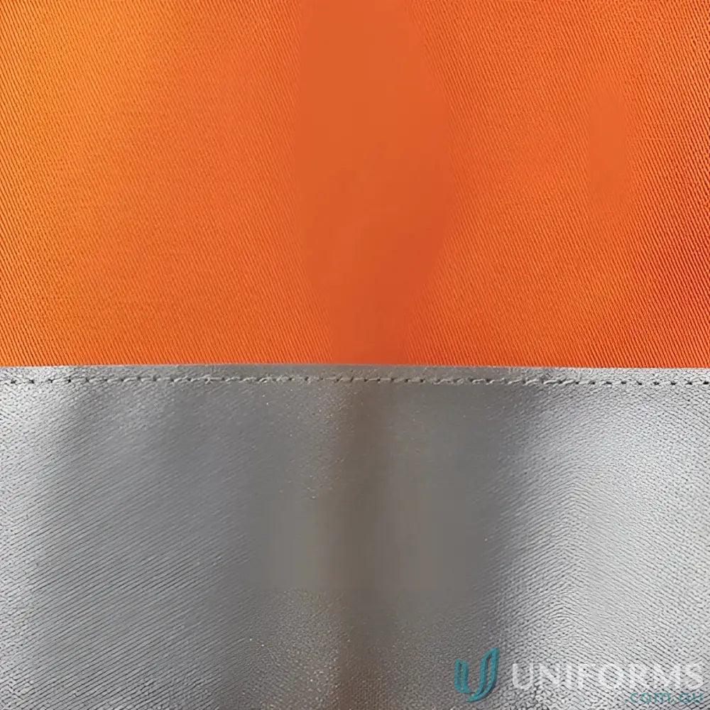 Orange and silver reflective fabric on JBs HiVis work uniforms for high visibility workwear