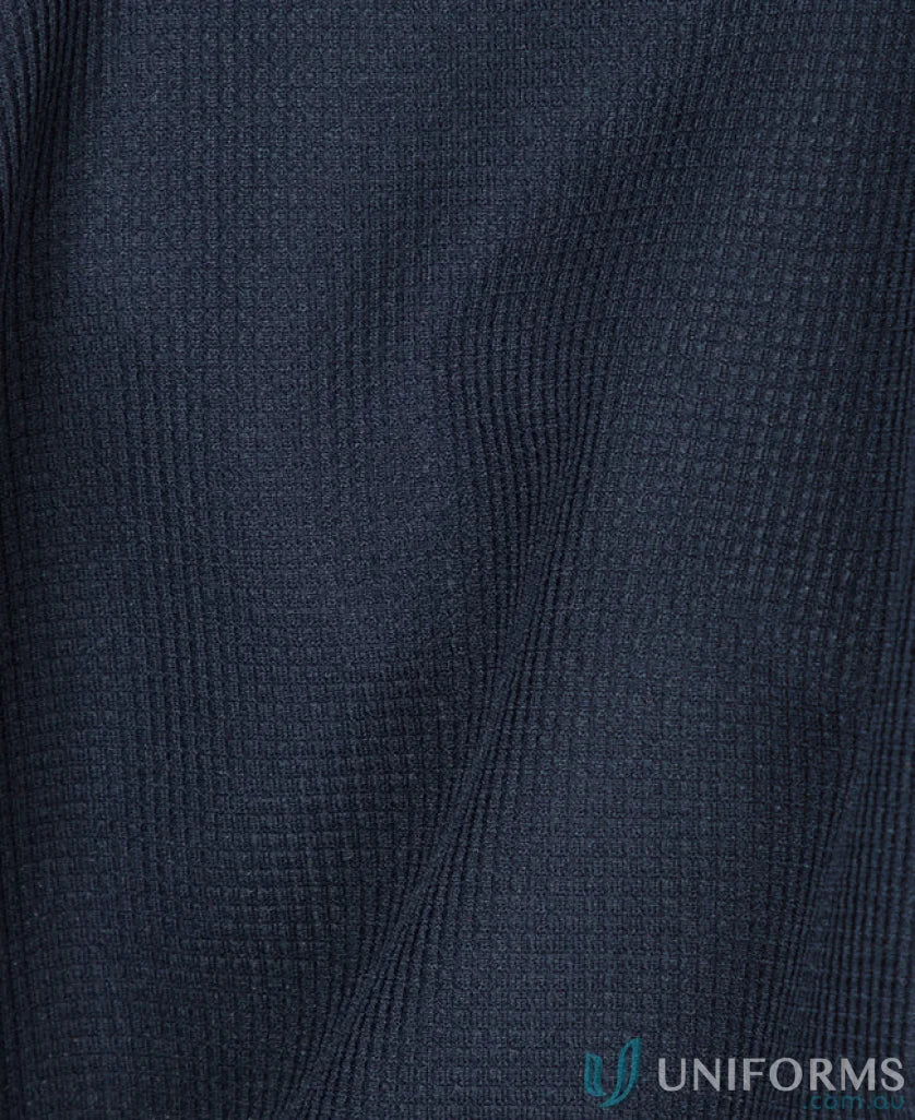 Dark blue textured fabric from JB’s Podium Waffle Pocket Long Sleeve Polo