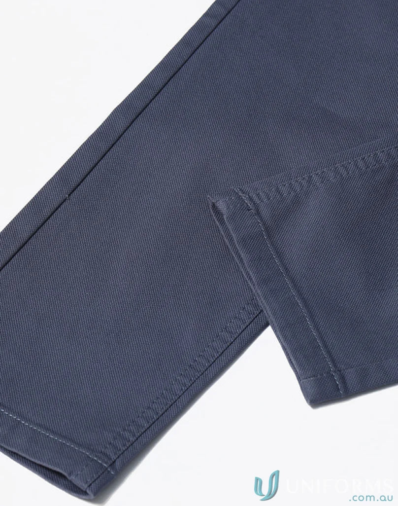 Blue denim pants leg featuring jean style flexi chino pants with jacquard weave