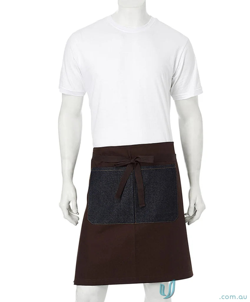 Jimmy Canvas Waist Apron with sage green cotton canvas and brass rivets on mannequin