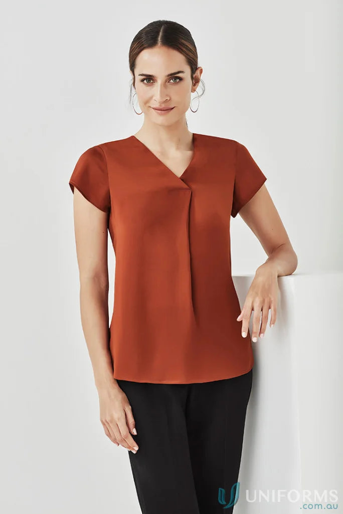 Woman’s rust-colored Kayla V-Neck Pleat Blouse RB967LS from Biz Collection