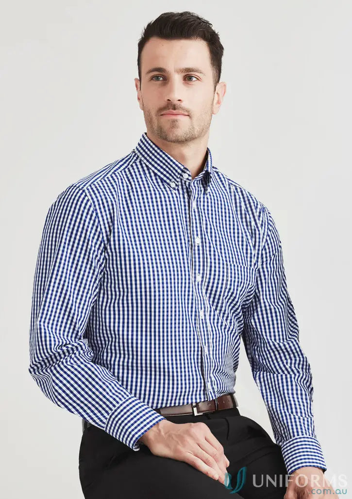 Man in a blue and white checkered workwear shirt from KENNARDS Mens Check LS Shirt
