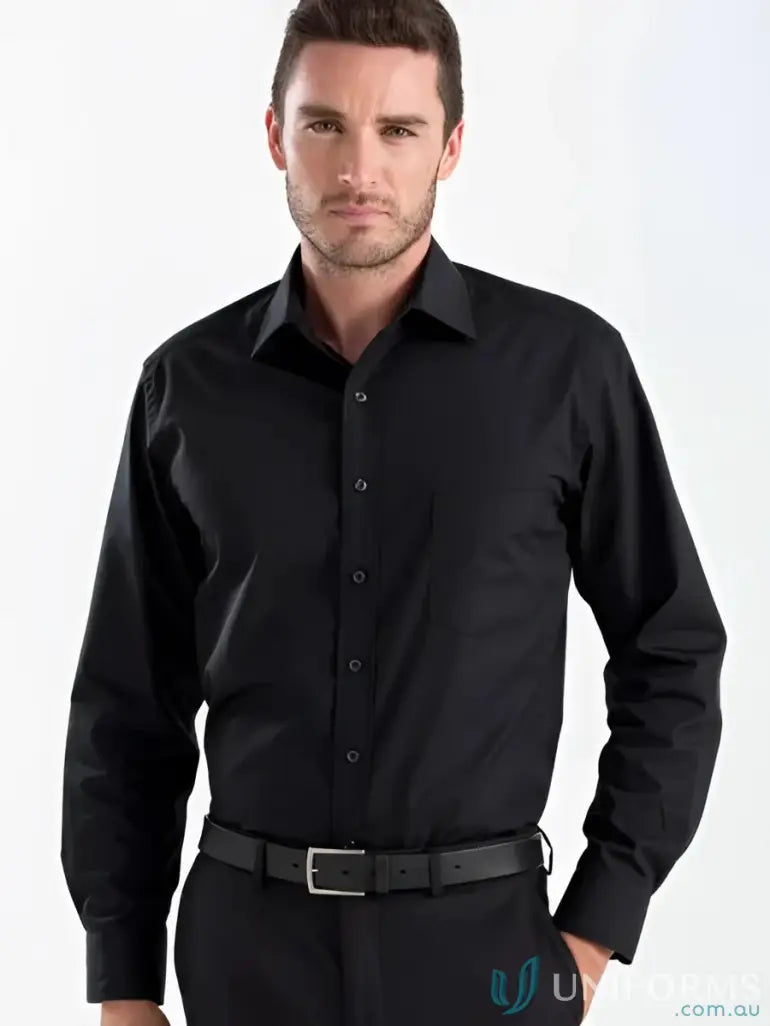 Man wears Keval Long Sleeve Poplin Shirt with single chest pocket and black pants