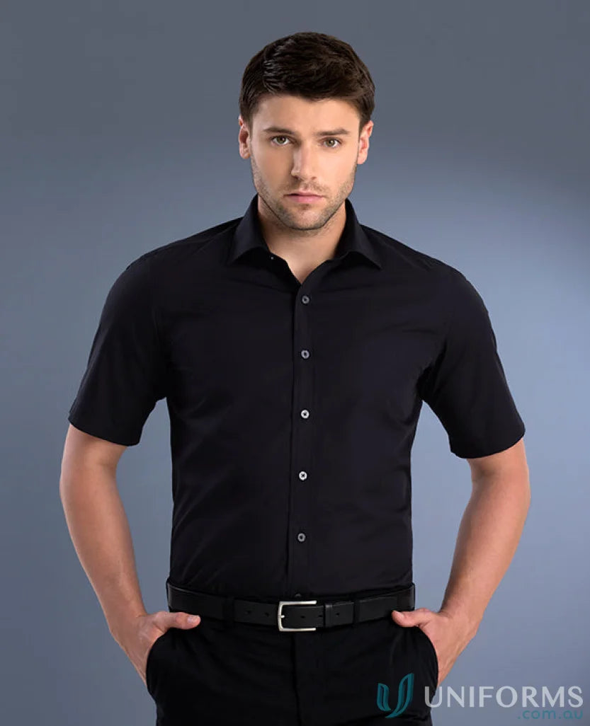 Man in a black slim fit short sleeve Keval Men’s Keval Poplin SS Shirt for men