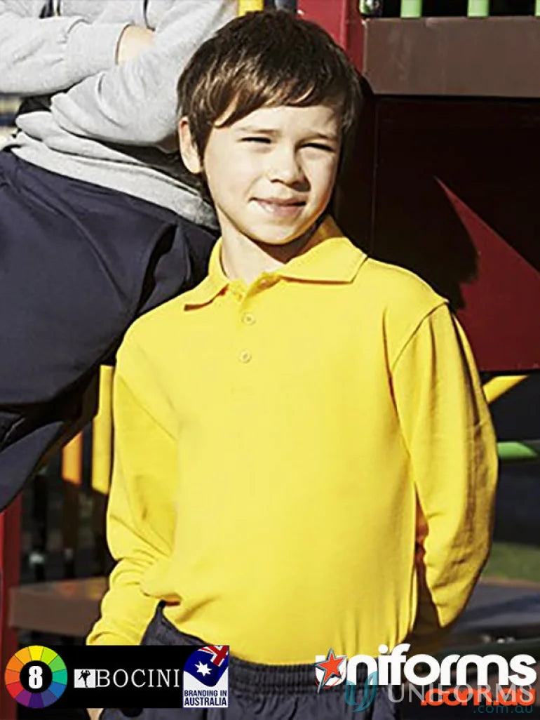Young boy wearing a yellow long sleeve polo from Kids L/S Basic Polo collection