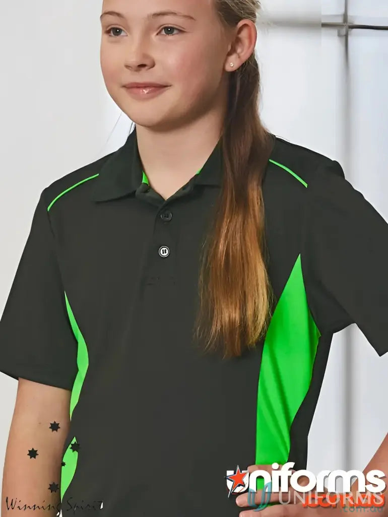Young girl modeling Kids Pursuit Polo black and lime green PS79K Pursuit polo shirt