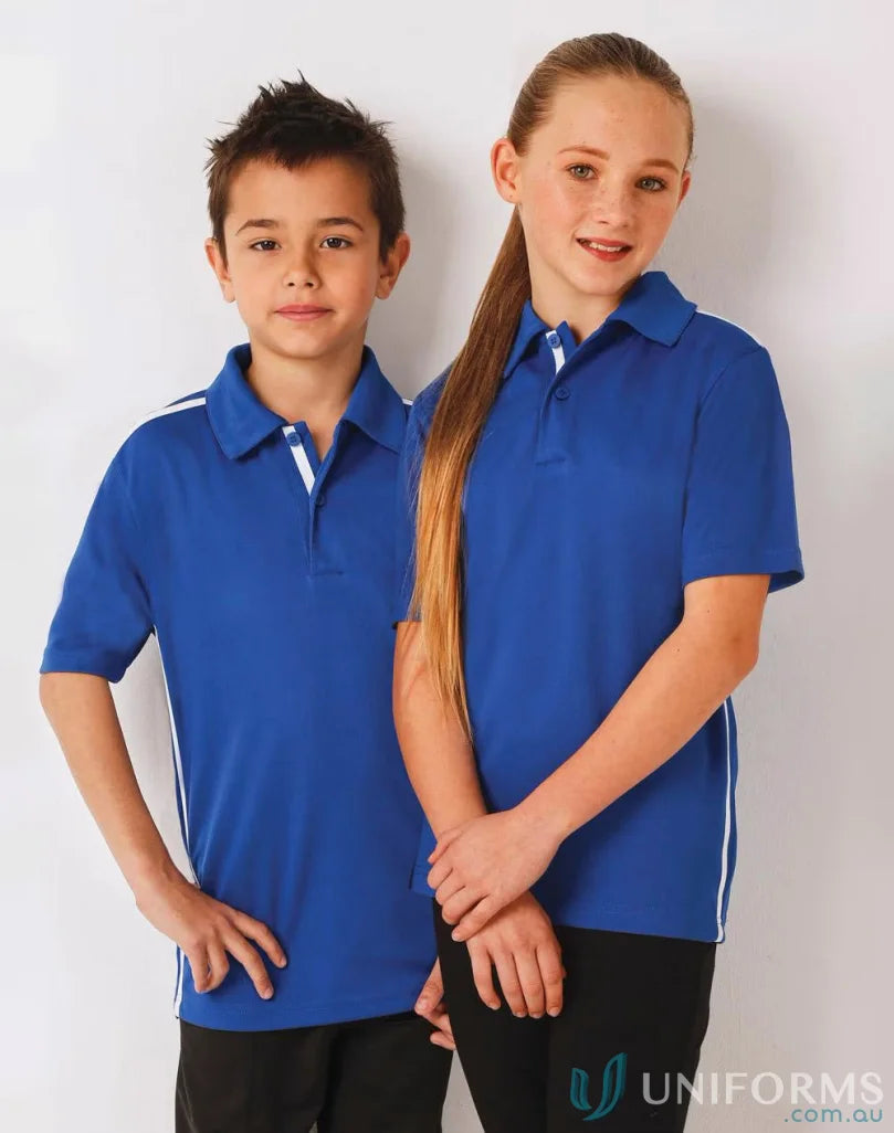 Two kids wearing matching royal blue ps83k Staten Polo shirts from Kids Staten Rapid collection