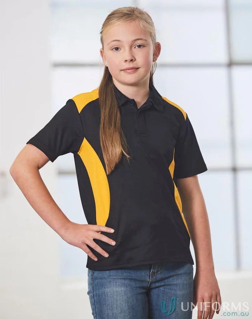 Kids TrueDry Winner contrast short sleeve polo shirt with a girl in blue jeans