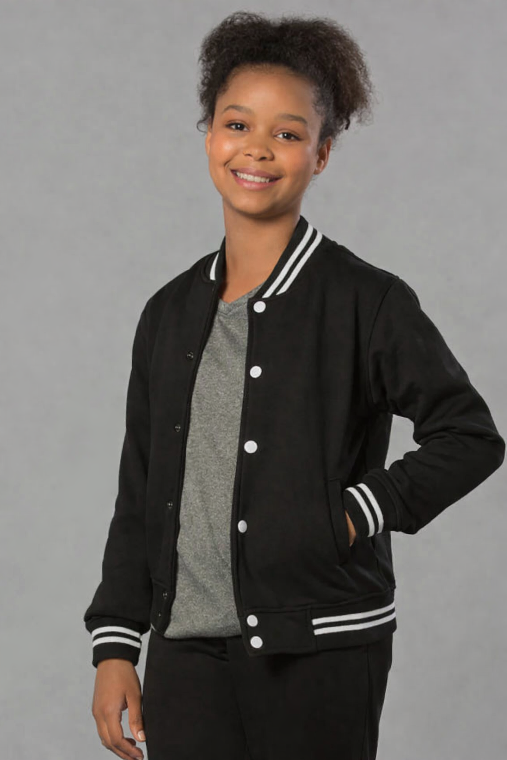 Kids fleece varsity jacket in black with white trim and buttons