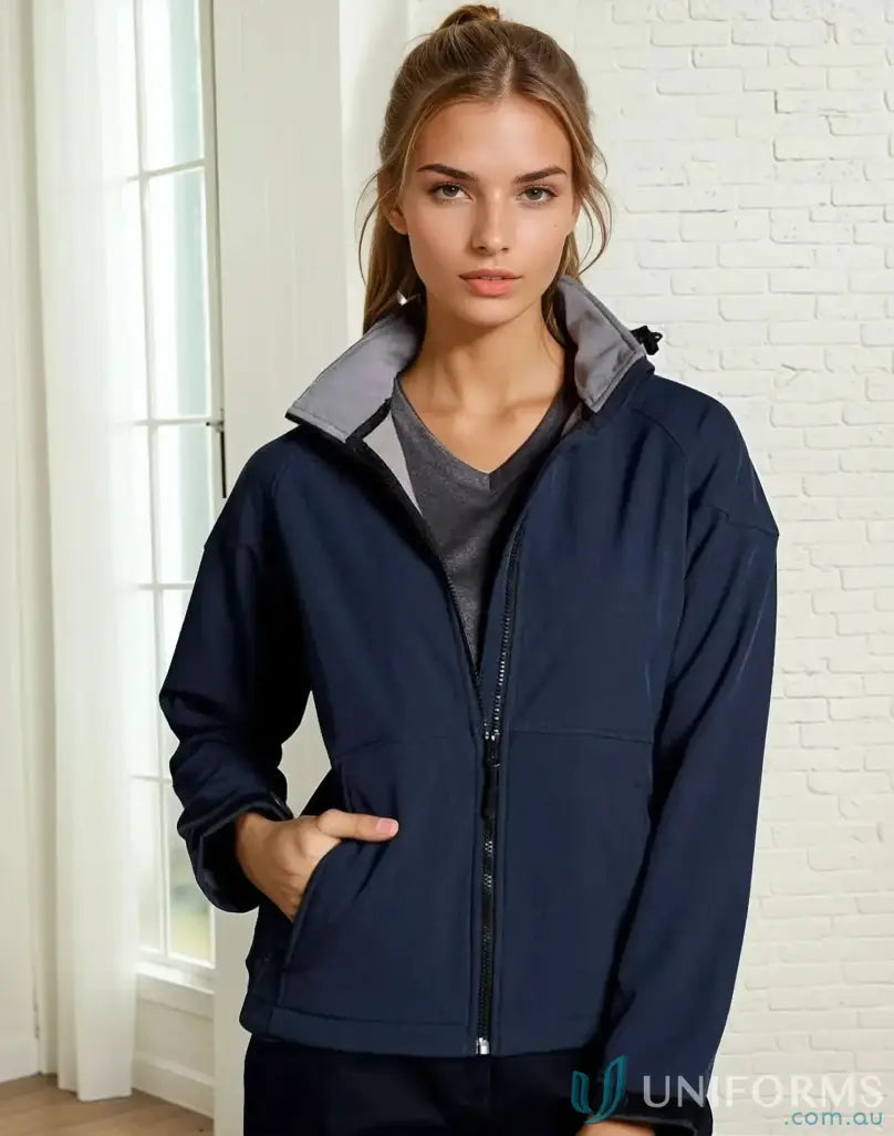 Ladies Aspen softshell hooded jacket in navy blue with gray collar and black zipper