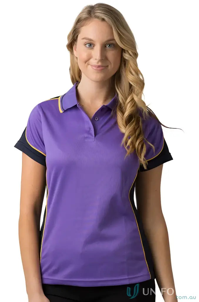 Lady wearing a purple and black Ladies Auburn Polo in cooldry micromesh fabric
