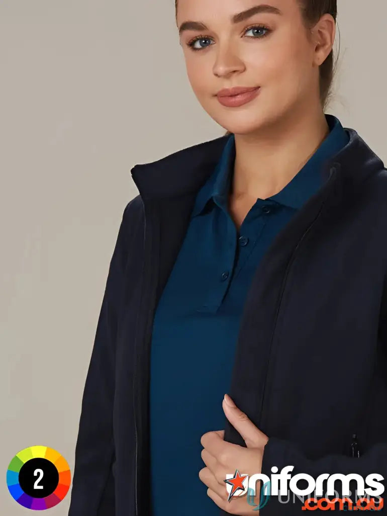 Ladies Micro Bonded Polar Fleece Jacket in navy blue with matching polo shirt, perfect for chilly days