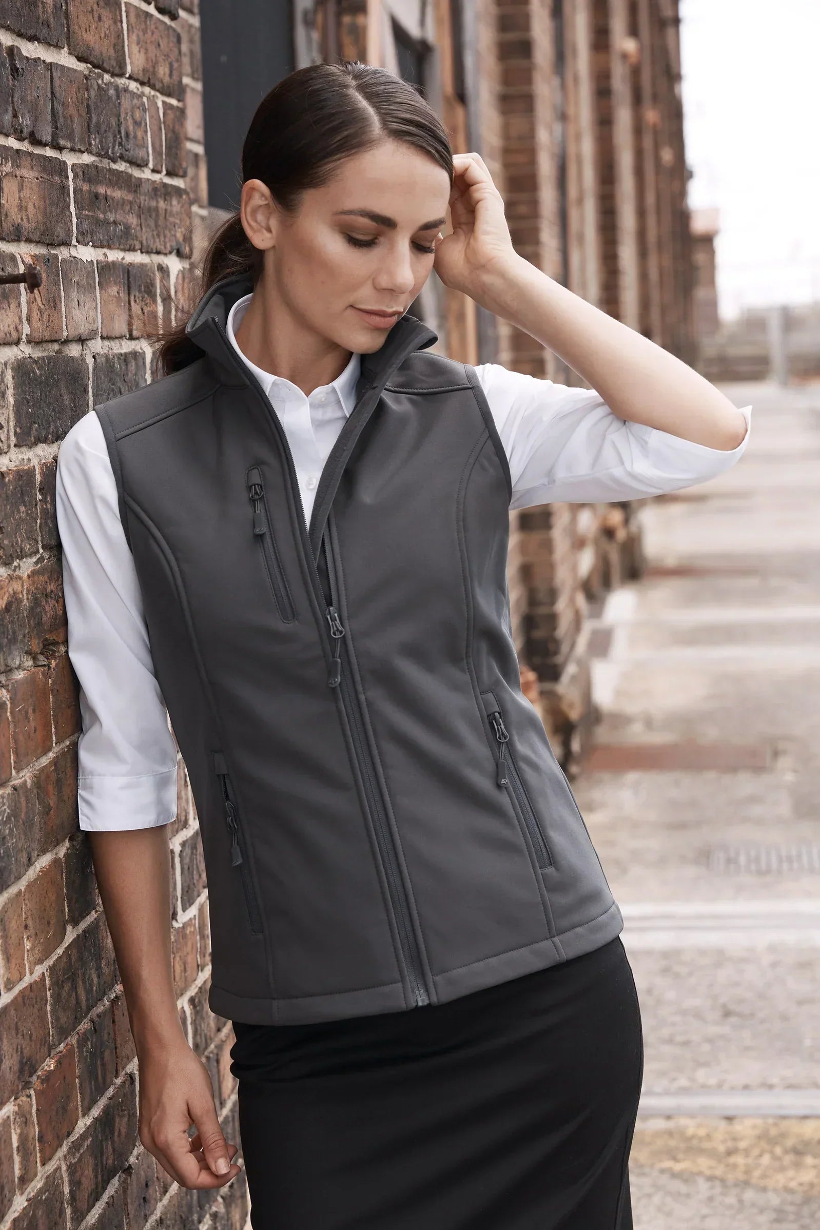 Ladies Chariot dark gray softshell vest with zip and side pockets for workwear