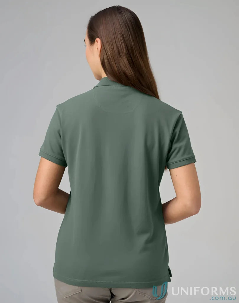 Woman’s green polo shirt from PS56 Darling Harbour with a winning spirit ladies vibe