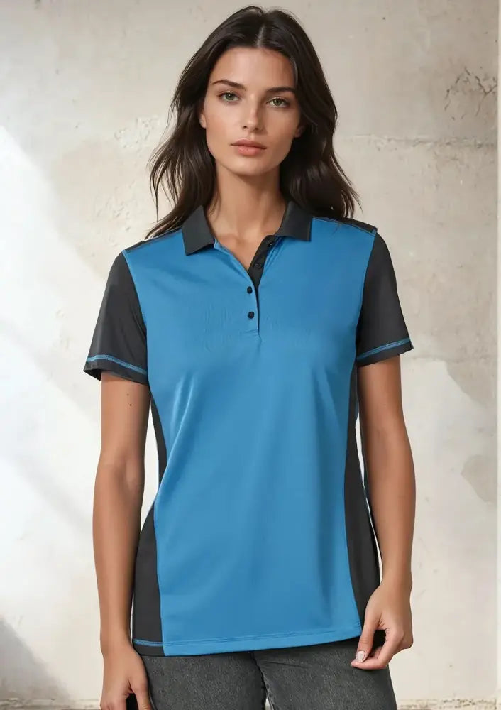 Lady wearing a Ladies Dart Polo in honeycomb knit fabric from Biz Collection Ladies