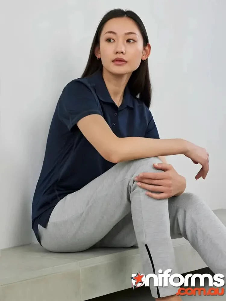 Ladies Dart Polo in honeycomb knit fabric with navy top and gray sweatpants for ladies Biz Collection