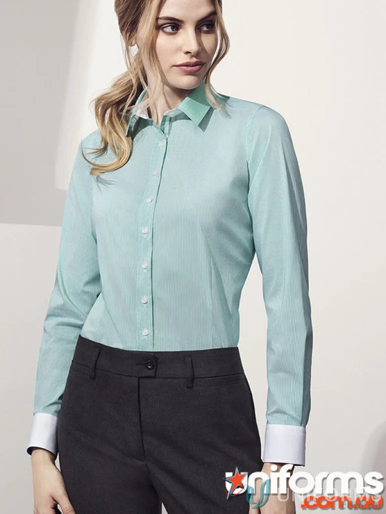 Woman’s light blue striped button-down shirt with inside cuff details, perfect for workwear or uniforms