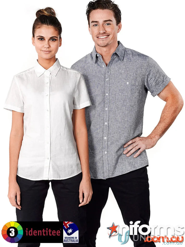 Two women wearing ladies Floyd short sleeve linen cotton shirt and black pants