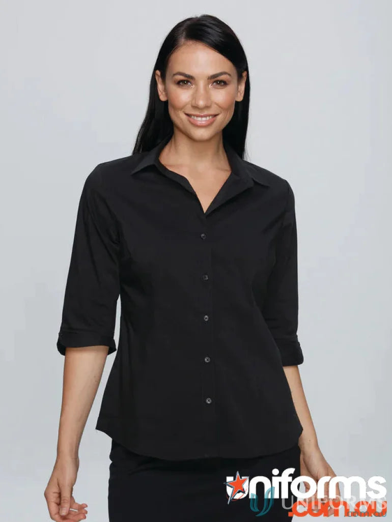 Lady wearing a black three-quarter sleeve workwear shirt from the Kingswood collection