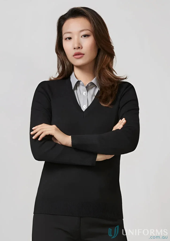 Woman wearing black knit pullover, ladies knit pullover, perfect for casual style