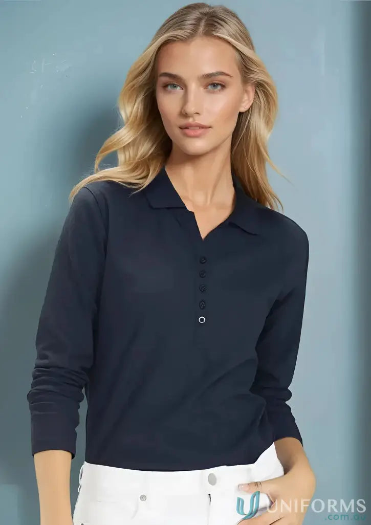 Lady wearing navy long sleeve polo from Biz Collection Ladies p400ll LS Polo