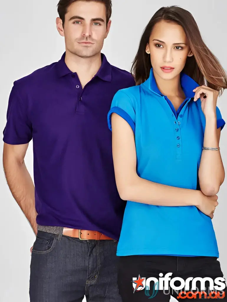 Man and woman showing off Ladies Krue Polo, perfect for workwear game and Talon Polo style