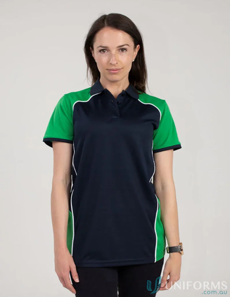 Woman’s navy and green McPherson Polo with cooldry moisture management and recycled fibres