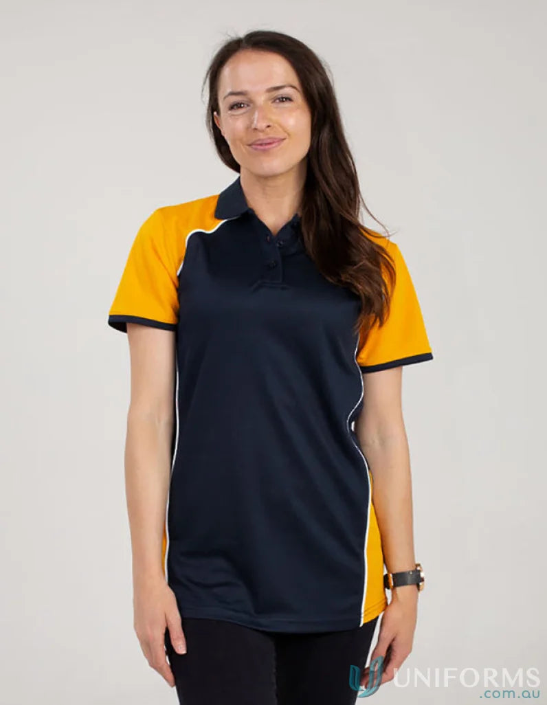 Woman’s navy and gold Ladies McPherson Polo with cooldry moisture management and recycled fibres