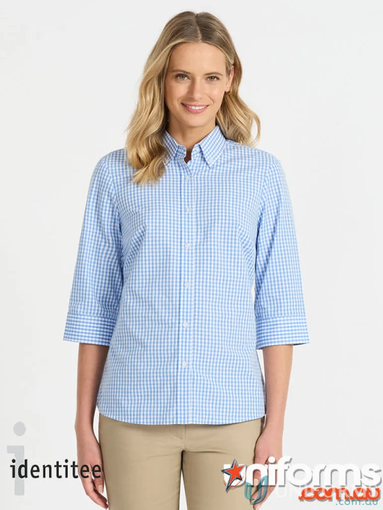 Woman wearing ladies Miller Gingham 3Q check shirt in blue and white gingham pattern