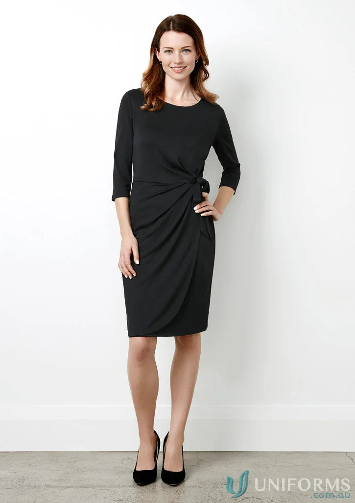 Elegant black wrap dress from Ladies Paris Dress in biz collection women’s paris dress line