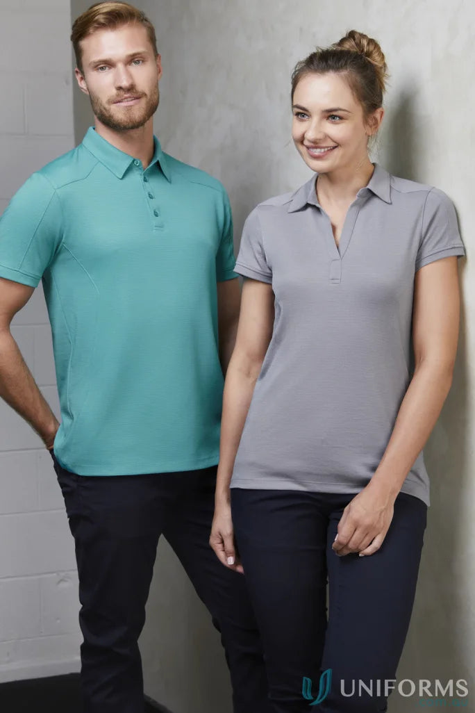Two people wearing stylish ladies profile polo shirts, feeling fresh in p706ls ladies profile